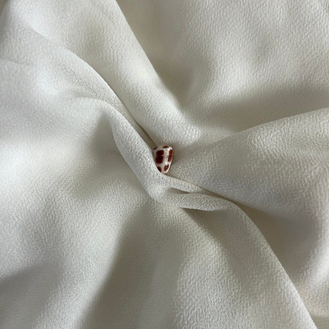 Bigger than the extra manini Hebrew cone shell stud