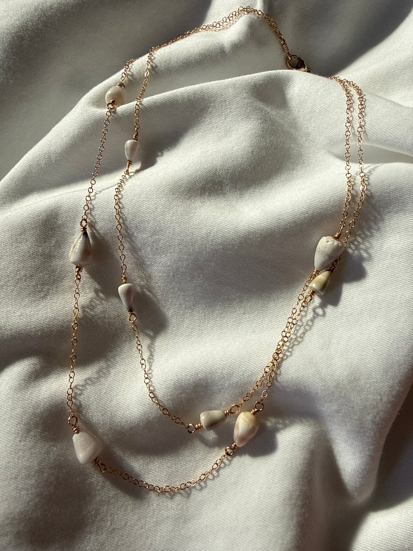 Double layered white cone shell necklace