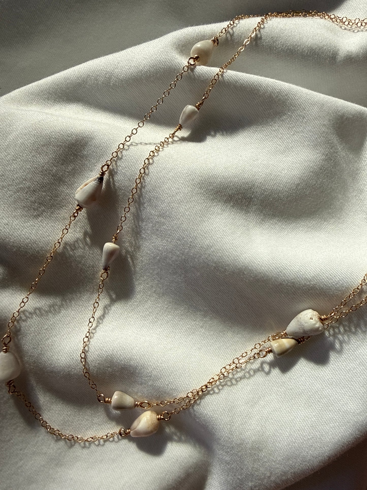Double layered white cone shell necklace